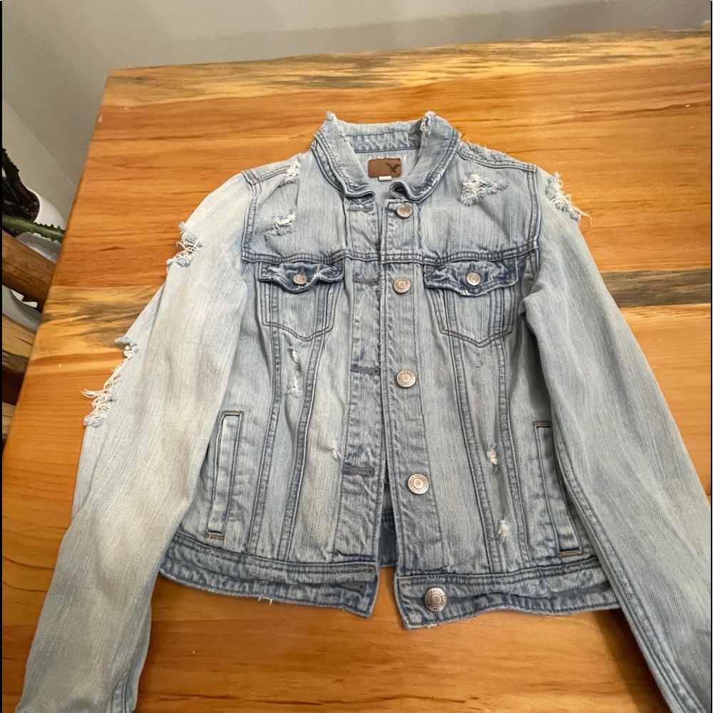 American Eagle Distressed Jean Jacket Size M.